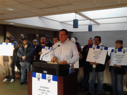 Marathon County supervisor John Robinson speaks at a rally supporting the Affordable Care Act for Wisconsin, January 22, 2013 Marathon County supervisor John Robinson speaks at a rally supporting the Affordable Care Act for Wisconsin, January 22, 2013