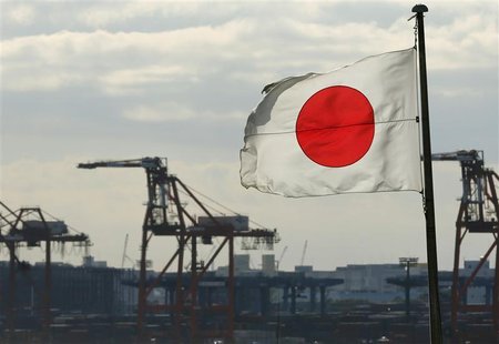 A Japanese flag flutters in front of a shipping container area, at a port in Tokyo December 19, 2012. REUTERS/Yuriko Nakao A Japanese flag flutters in front of a shipping container area, at a port in Tokyo December 19, 2012. REUTERS/Yuriko Nakao