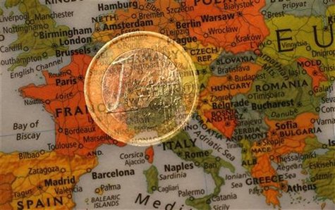 A picture illustration taken with the multiple exposure function of the camera shows a one Euro coin and a map of Europe, January 9, 2013. R A picture illustration taken with the multiple exposure function of the camera shows a one Euro coin and a map of Europe, January 9, 2013. R