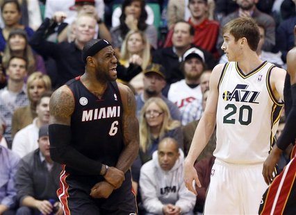 Utah Jazz guard Gordon Hayward (R) watches as Miami Heat forward LeBron James reacts to a call during the second half of their NBA basketbal Utah Jazz guard Gordon Hayward (R) watches as Miami Heat forward LeBron James reacts to a call during the second half of their NBA basketbal