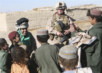 2nd Lt. Carly E. Towers (R), the officer in charge of the female engagement team, 2nd Battalion, 2nd Marine Regiment, and Sahima Sheren, or 2nd Lt. Carly E. Towers (R), the officer in charge of the female engagement team, 2nd Battalion, 2nd Marine Regiment, and Sahima Sheren, or