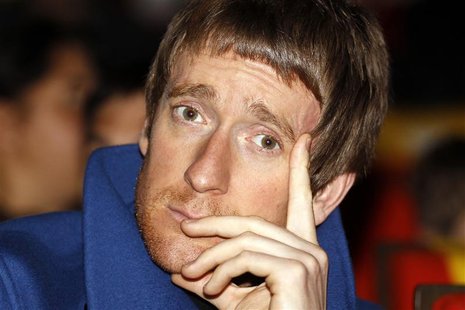 Britain's cyclist Bradley Wiggins attends the presentation of the itinerary of the 2013 Tour de France cycling race in Paris October 24, 201 Britain's cyclist Bradley Wiggins attends the presentation of the itinerary of the 2013 Tour de France cycling race in Paris October 24, 201
