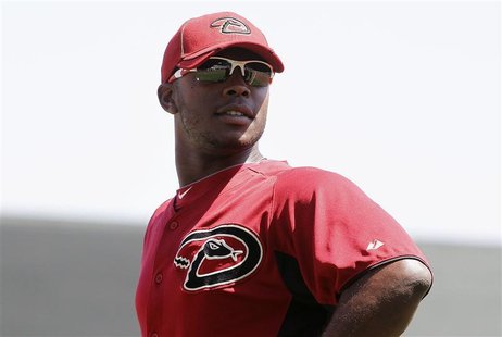 Arizona Diamondbacks' Justin Upton looks at fans during their MLB spring training baseball game against the Cleveland Indians in Scottsdale, Arizona Diamondbacks' Justin Upton looks at fans during their MLB spring training baseball game against the Cleveland Indians in Scottsdale,