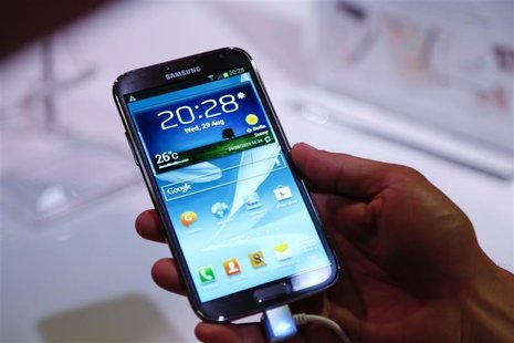 The new Samsung Galaxy Note II tablet device is pictured during Samsung Mobile Unpacked 2012 event in Berlin's Tempodrom hall ahead of the s The new Samsung Galaxy Note II tablet device is pictured during Samsung Mobile Unpacked 2012 event in Berlin's Tempodrom hall ahead of the s
