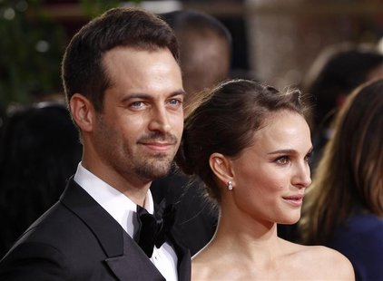 Actress Natalie Portman and partner Benjamin Millepied arrive at the 69th annual Golden Globe Awards in Beverly Hills, California January 15 Actress Natalie Portman and partner Benjamin Millepied arrive at the 69th annual Golden Globe Awards in Beverly Hills, California January 15