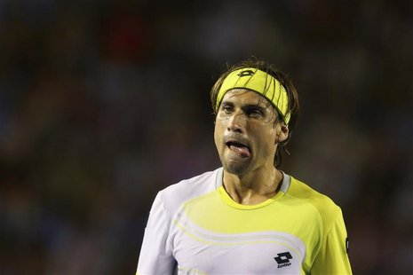 David Ferrer of Spain reacts during his men's singles semi-final match against Novak Djokovic of Serbia at the Australian Open tennis tourna David Ferrer of Spain reacts during his men's singles semi-final match against Novak Djokovic of Serbia at the Australian Open tennis tourna