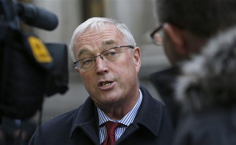 Union Cycliste Internationale (UCI) President Pat McQuaid speaks to reporters as he leaves a procedural hearing in London January 25, 2013. Union Cycliste Internationale (UCI) President Pat McQuaid speaks to reporters as he leaves a procedural hearing in London January 25, 2013.