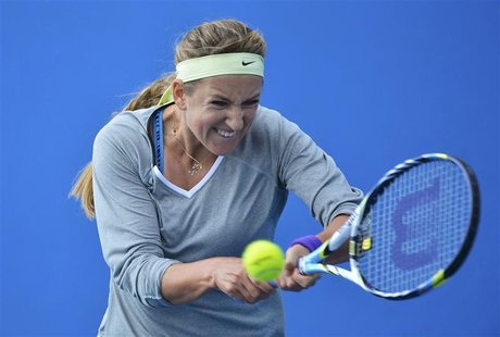 Victoria Azarenka of Belarus hits a shot during a practice session at the Australian Open tennis tournament in Melbourne January 25, 2013. R Victoria Azarenka of Belarus hits a shot during a practice session at the Australian Open tennis tournament in Melbourne January 25, 2013. R