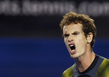 Andy Murray of Britain reacts during his men's singles semi-final match against Roger Federer of Switzerland at the Australian Open tennis t Andy Murray of Britain reacts during his men's singles semi-final match against Roger Federer of Switzerland at the Australian Open tennis t