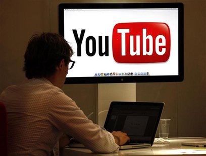 A visitor is seen at the You Tube stand during the annual MIPCOM television programme market in Cannes, southeastern France, October 3, 2011 A visitor is seen at the You Tube stand during the annual MIPCOM television programme market in Cannes, southeastern France, October 3, 2011