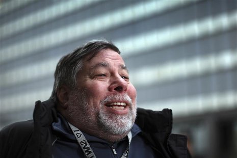 Apple co-founder Steve Wozniak talks to a reporter as he and his wife Janet wait in line overnight with customers to purchase the new iPad a Apple co-founder Steve Wozniak talks to a reporter as he and his wife Janet wait in line overnight with customers to purchase the new iPad a
