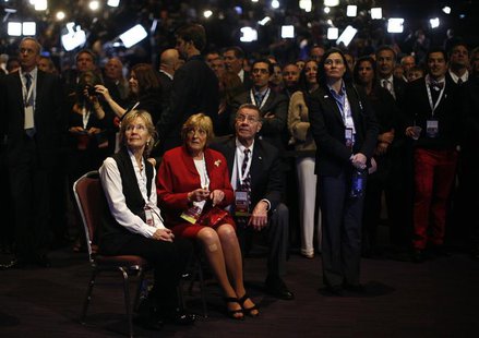 Republican presidential nominee Mitt Romney's supporters listen to his concession speech during his election night rally in Boston, Massachu Republican presidential nominee Mitt Romney's supporters listen to his concession speech during his election night rally in Boston, Massachu
