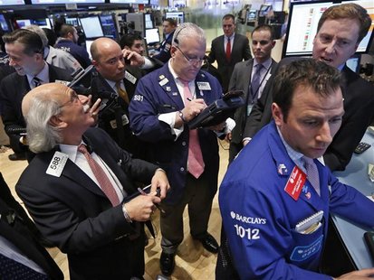 Traders work on the floor of the New York Stock Exchange, January 23, 2013. REUTERS/Brendan McDermid Traders work on the floor of the New York Stock Exchange, January 23, 2013. REUTERS/Brendan McDermid