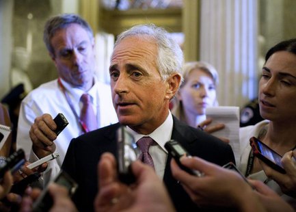 Senator Robert Corker (R-TN) speaks to the media before voting on a bill allowing a rise in the debt ceiling on Capitol Hill in Washington i Senator Robert Corker (R-TN) speaks to the media before voting on a bill allowing a rise in the debt ceiling on Capitol Hill in Washington i