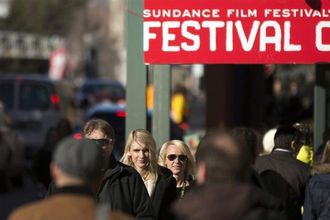 Pedestrians walk down Main street during the Sundance Film Festival in Park City, Utah, January 20, 2013. REUTERS/Lucas Jackson Pedestrians walk down Main street during the Sundance Film Festival in Park City, Utah, January 20, 2013. REUTERS/Lucas Jackson