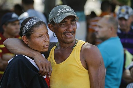 Relatives of an inmate of the Centro Occidental (Uribana) prison who died during the uprising at the prison cry outside a morgue in Barquisi Relatives of an inmate of the Centro Occidental (Uribana) prison who died during the uprising at the prison cry outside a morgue in Barquisi
