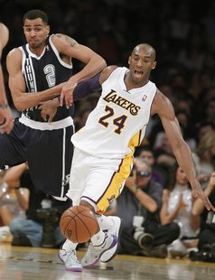 Oklahoma City Thunder shooting guard Thabo Sefolosha (2) knocks the ball away from Los Angeles Lakers shooting guard Kobe Bryant (24) to ste Oklahoma City Thunder shooting guard Thabo Sefolosha (2) knocks the ball away from Los Angeles Lakers shooting guard Kobe Bryant (24) to ste