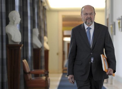Belgium's Central Bank Governor Luc Coene arrives for a news conference on the 2013 economic forecast, in Brussels December 10, 2012. REUTER Belgium's Central Bank Governor Luc Coene arrives for a news conference on the 2013 economic forecast, in Brussels December 10, 2012. REUTER