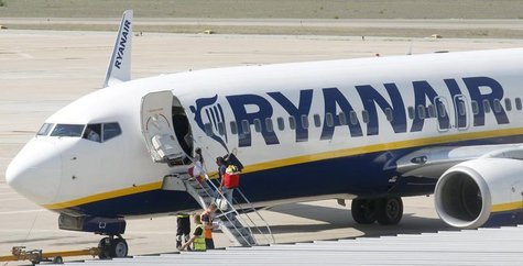 Passengers board a Ryanair plane parked at Girona airport, September 20, 2012. REUTERS/Albert Gea Passengers board a Ryanair plane parked at Girona airport, September 20, 2012. REUTERS/Albert Gea