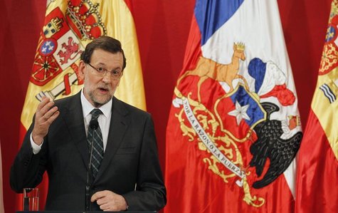 Spain's Prime Minister Mariano Rajoy speaks to the media after a bilateral meeting with Chile's President Sebastian Pinera at La Moneda Pres Spain's Prime Minister Mariano Rajoy speaks to the media after a bilateral meeting with Chile's President Sebastian Pinera at La Moneda Pres