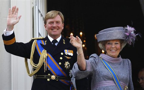 Netherlands' Queen Beatrix (R) and her son Crown Prince Willem-Alexander are seen waving to well-wishers from the balcony of the Royal Noord Netherlands' Queen Beatrix (R) and her son Crown Prince Willem-Alexander are seen waving to well-wishers from the balcony of the Royal Noord