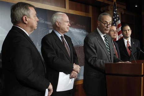 (L-R) Senators Richard Durbin (D-IL), John McCain (R-AZ), Charles Schumer (D-NY), Robert Menendez (D-NJ), and Marco Rubio (R-FL) attend a ne (L-R) Senators Richard Durbin (D-IL), John McCain (R-AZ), Charles Schumer (D-NY), Robert Menendez (D-NJ), and Marco Rubio (R-FL) attend a ne