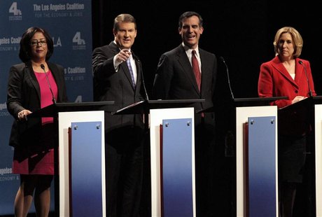 Los Angeles Mayoral candidates L-R Jan Perry, Kevin James, Eric Garcetti, and Wendy Greuel stand on stage during debate of candidates for ma Los Angeles Mayoral candidates L-R Jan Perry, Kevin James, Eric Garcetti, and Wendy Greuel stand on stage during debate of candidates for ma