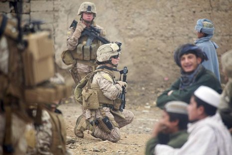 U.S. Marine Corps Lance Cpl. Sienna De Santis and U.S. Navy Petty Officer 3rd Class Heidi Dean, both with Female Engagement Team, India Comp U.S. Marine Corps Lance Cpl. Sienna De Santis and U.S. Navy Petty Officer 3rd Class Heidi Dean, both with Female Engagement Team, India Comp