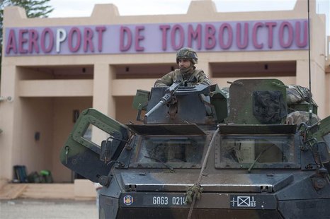 French troops, aboard an armoured vehicle, guard the Timbuktu airport in this January 28, 2013 picture provided by the French Military audio French troops, aboard an armoured vehicle, guard the Timbuktu airport in this January 28, 2013 picture provided by the French Military audio