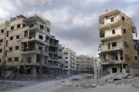 A general view shows damaged buildings in Mleha suburb of Damascus, January 24, 2013. REUTERS/Sami Zbeidi A general view shows damaged buildings in Mleha suburb of Damascus, January 24, 2013. REUTERS/Sami Zbeidi
