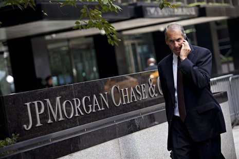 A man walks past JP Morgan Chase's international headquarters on Park Avenue in New York in this July 13, 2012 file photo. REUTERS/Andrew Bu A man walks past JP Morgan Chase's international headquarters on Park Avenue in New York in this July 13, 2012 file photo. REUTERS/Andrew Bu