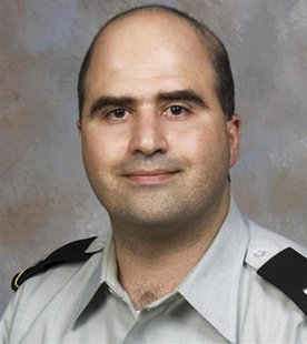 Major Nidal Malik Hasan, the U.S. Army psychiatrist charged in a mass shooting at the U.S. Army post in Fort Hood, Texas, is seen in this un Major Nidal Malik Hasan, the U.S. Army psychiatrist charged in a mass shooting at the U.S. Army post in Fort Hood, Texas, is seen in this un
