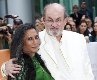 Director Deepa Mehta (L) and author Salman Rushdie arrive at the gala presentation for the film "Midnight's Children" during the 37th Toront Director Deepa Mehta (L) and author Salman Rushdie arrive at the gala presentation for the film "Midnight's Children" during the 37th Toront