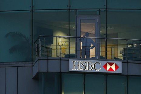 A man uses a mobile phone in a branch of HSBC in St Helier, Jersey November 12, 2012. REUTERS/Stefan Wermuth A man uses a mobile phone in a branch of HSBC in St Helier, Jersey November 12, 2012. REUTERS/Stefan Wermuth