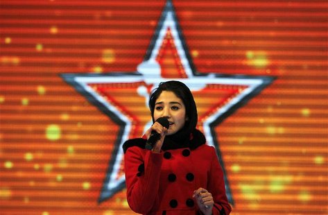Afghan's Latifa Azizi performs on the "Afghan star" talent show in Kabul January 29, 2013. REUTERS/Omar Sobhani Afghan's Latifa Azizi performs on the "Afghan star" talent show in Kabul January 29, 2013. REUTERS/Omar Sobhani