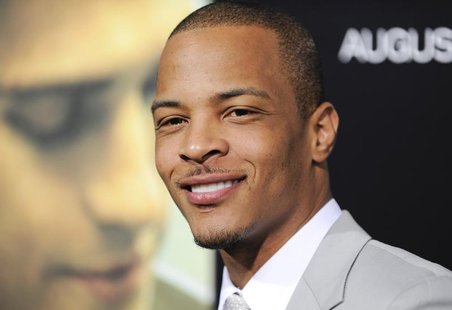 Actor Tip "T.I." Harris arrives at the premiere of "Takers" in Los Angeles, California, August 4, 2010. REUTERS/Gus Ruelas Actor Tip "T.I." Harris arrives at the premiere of "Takers" in Los Angeles, California, August 4, 2010. REUTERS/Gus Ruelas