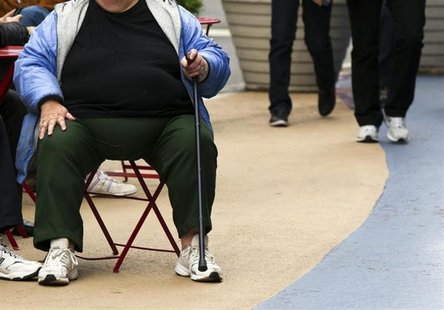 An overweight woman sits on a chair in Times Square in New York, May 8, 2012. REUTERS/Lucas Jackson An overweight woman sits on a chair in Times Square in New York, May 8, 2012. REUTERS/Lucas Jackson