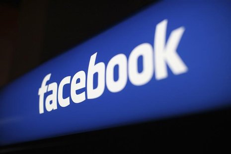 The Facebook logo is pictured at the Facebook headquarters in Menlo Park, California January 29, 2013. REUTERS/Robert Galbraith The Facebook logo is pictured at the Facebook headquarters in Menlo Park, California January 29, 2013. REUTERS/Robert Galbraith