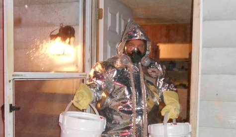 In this photo supplied by the Calhoun County Sheriffs Department, a deputy is shown wearing a protective suit to remove the volatile, flammable and toxic chemicals used to manufacture the illicit drug. In this photo supplied by the Calhoun County Sheriffs Department, a deputy is shown wearing a protective suit to remove the volatile, flammable and toxic chemicals used to manufacture the illicit drug.
