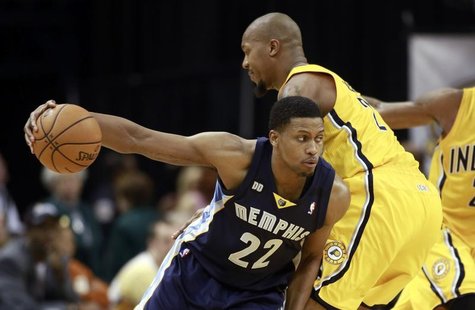 Memphis Grizzlies forward Rudy Gay drives against Indiana Pacers forward David West during the fourth quarter of their NBA basketball game i Memphis Grizzlies forward Rudy Gay drives against Indiana Pacers forward David West during the fourth quarter of their NBA basketball game i