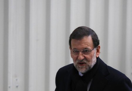 Spanish Prime Minister Mariano Rajoy arrives at Parliament to attend a government's control session in Madrid January 30, 2013. REUTER/Sergi Spanish Prime Minister Mariano Rajoy arrives at Parliament to attend a government's control session in Madrid January 30, 2013. REUTER/Sergi