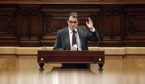 Catalunya's President Artur Mas gestures during a speech at a session of the Catalunya's Parliament in Barcelona, January 23, 2013. REUTERS/ Catalunya's President Artur Mas gestures during a speech at a session of the Catalunya's Parliament in Barcelona, January 23, 2013. REUTERS/