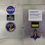 Locked doors, behind which is a room housing pieces of Space Shuttle Columbia, are pictured at the Kennedy Space Center in Florida, January Locked doors, behind which is a room housing pieces of Space Shuttle Columbia, are pictured at the Kennedy Space Center in Florida, January