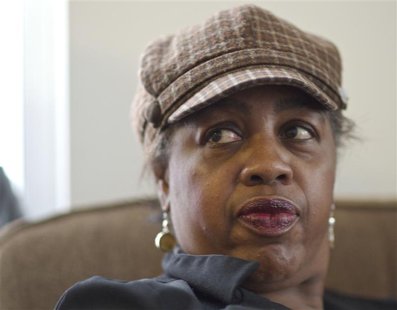 Shirley Chambers pauses in her living room during an interview in Chicago, Illinois, January 30, 2013. Chambers had four children - three bo Shirley Chambers pauses in her living room during an interview in Chicago, Illinois, January 30, 2013. Chambers had four children - three bo