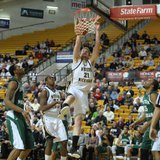 Shayne Whittington dunks at University Arena. Photo courtesy of wmubroncos.com