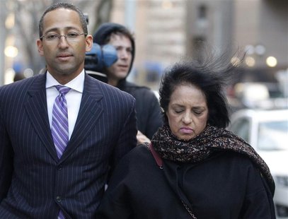 Roomy Khan, the former Intel executive exits the Manhattan Federal Courthouse with her lawyer (L) following her sentencing in New York Janua Roomy Khan, the former Intel executive exits the Manhattan Federal Courthouse with her lawyer (L) following her sentencing in New York Janua