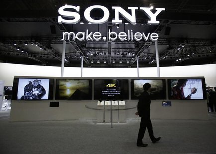 A visitor walks past Sony's booth at the Camera and Photo Imaging Show 2013 in Yokohama, south of Tokyo January 31, 2013. REUTERS/Yuya Shino A visitor walks past Sony's booth at the Camera and Photo Imaging Show 2013 in Yokohama, south of Tokyo January 31, 2013. REUTERS/Yuya Shino