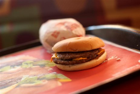 A McDouble burger is pictured at a McDonald's restaurant in the Fillmore District of San Francisco, California January 30, 2013. REUTERS/Rob A McDouble burger is pictured at a McDonald's restaurant in the Fillmore District of San Francisco, California January 30, 2013. REUTERS/Rob
