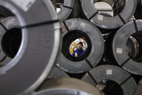 A labourer smokes as he works at a steel market in Wuxi, Jiangsu province January 11, 2013. REUTERS/Aly Song A labourer smokes as he works at a steel market in Wuxi, Jiangsu province January 11, 2013. REUTERS/Aly Song