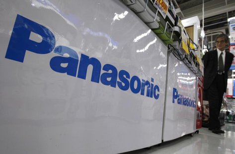 A customer looks at electronic products near Panasonic Corp logos at an electronic store in Tokyo June 27, 2012. REUTERS/Yuriko Nakao A customer looks at electronic products near Panasonic Corp logos at an electronic store in Tokyo June 27, 2012. REUTERS/Yuriko Nakao